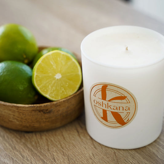 oshkana lemongrass candle with lime alongside it